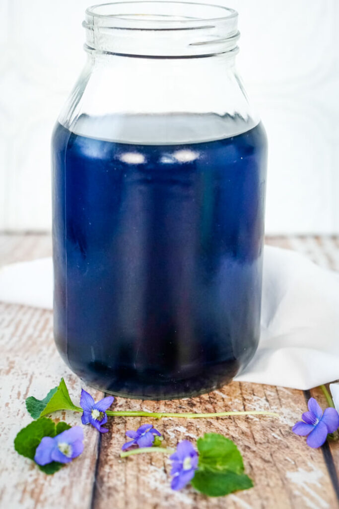 A jar of blue violet tea. 